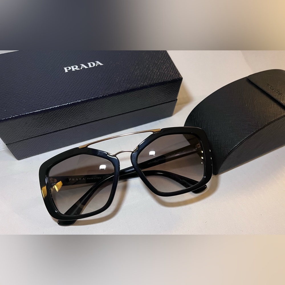 Black and gold Prada frames